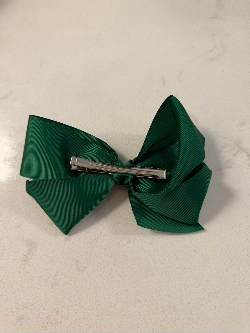 green hair bow clip